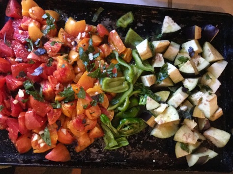 Toss veggies with oil & spread onto roasting pan